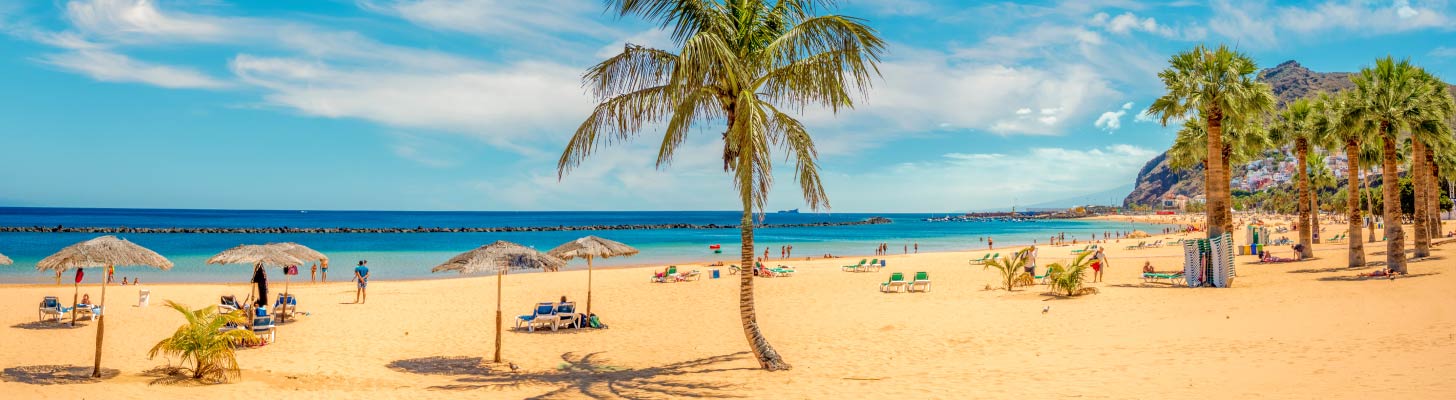 Holidaymakers on the beach in Tenerife