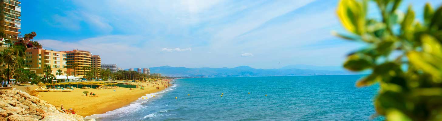 View of the golden sands of a beach in Torremolinos, Costa del Sol