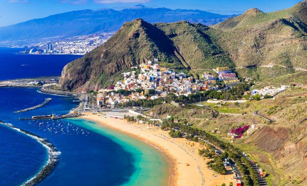 Town on the hillside overlooking the beach in Tenerife