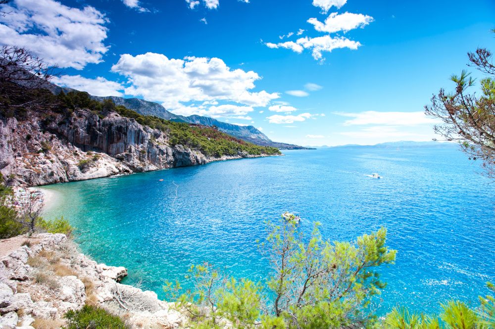 Stunning view of landscape with beautiful Adriatic Sea and quiet majestic bay in Dalmatia, Croatia, Europe. Summertime multicolored vibrant outdoors horizontal image with blue sky background.