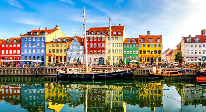 Traditional colourful buildings line the harbour in Copenhagen, Denmark