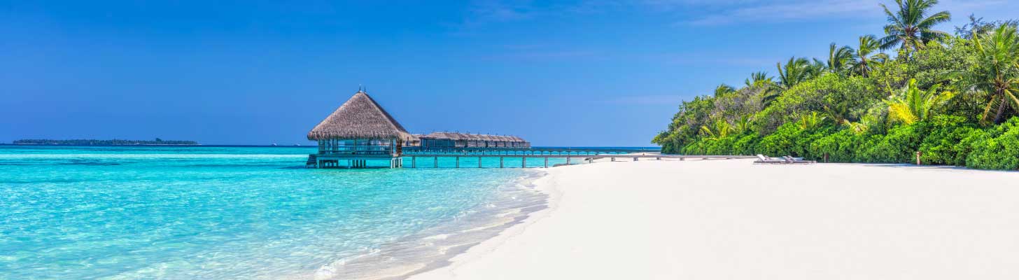 Water bungalows, white sands & crystal clear waters of the Maldives
