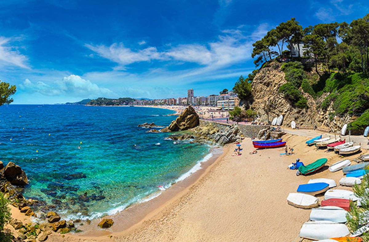 A small bay with boats on the beach in Costa Brava.