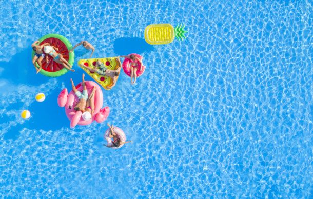 Friends in the pool with Inflatables