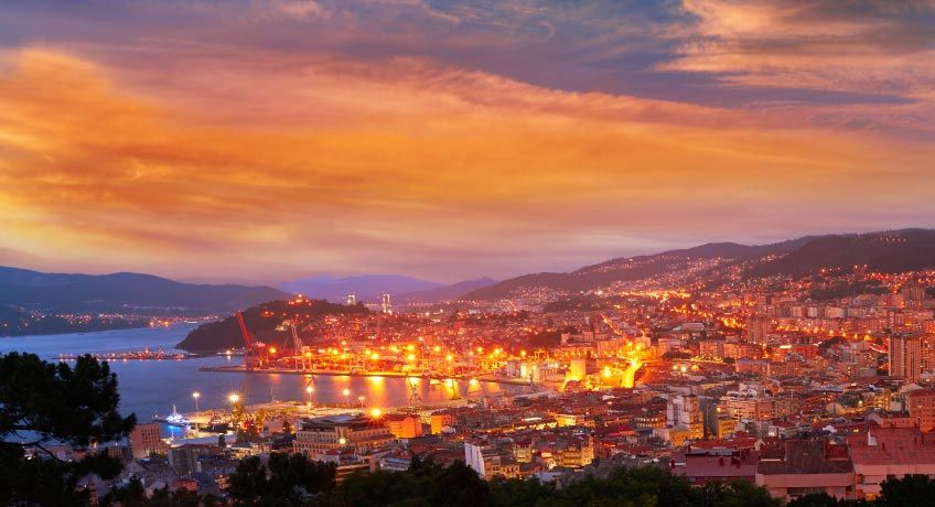 The city and port of Vigo all lit up at night
