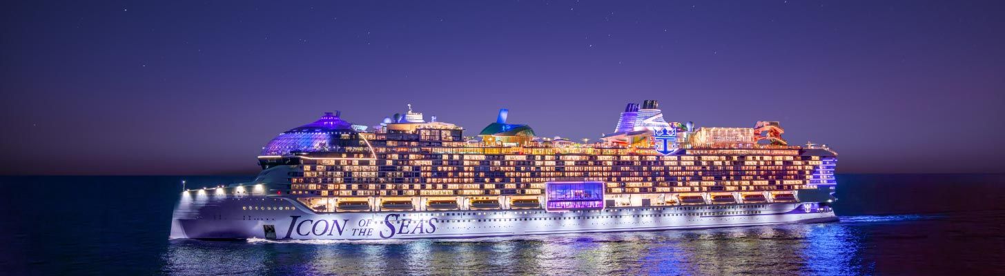 Royal Caribbean Cruises ship at sea all lit up at night