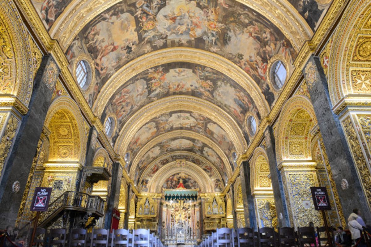 The domed art-work filled ceiling and walls of St John's Co-Cathedral in Malta Valletta