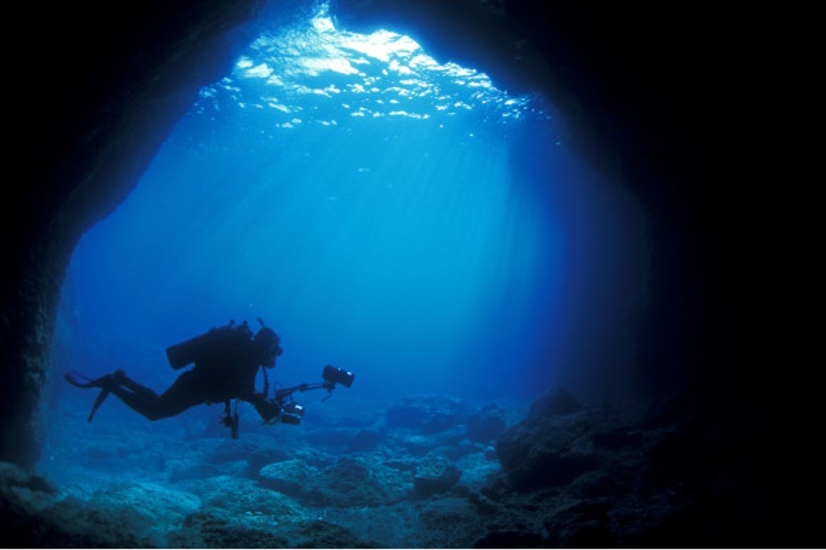 The underwater coves and caves off the coast of Marmaris explored by divers with cameras