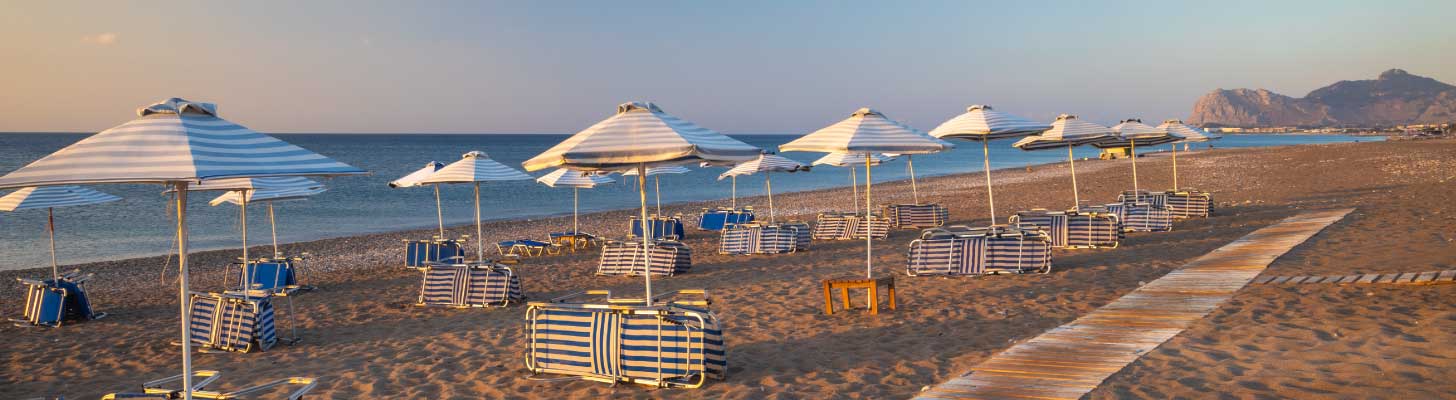 Sun umbrellas on Afandou beach in Rhodes