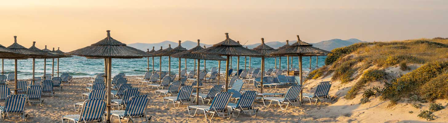 Sun loungers & umbrellas on Marmari beach in Kos