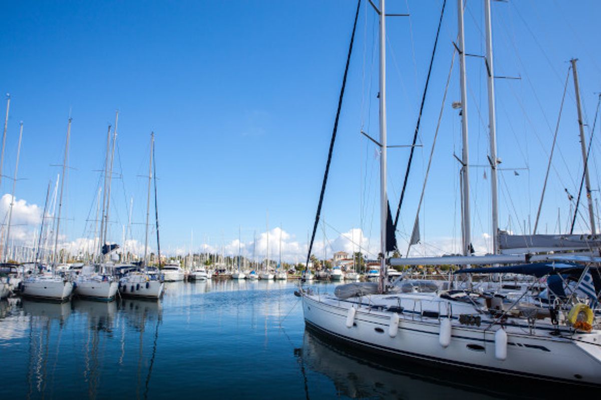 The scenic harbour in Gouvia on the island of Corfu, lined with traditional fishing boats