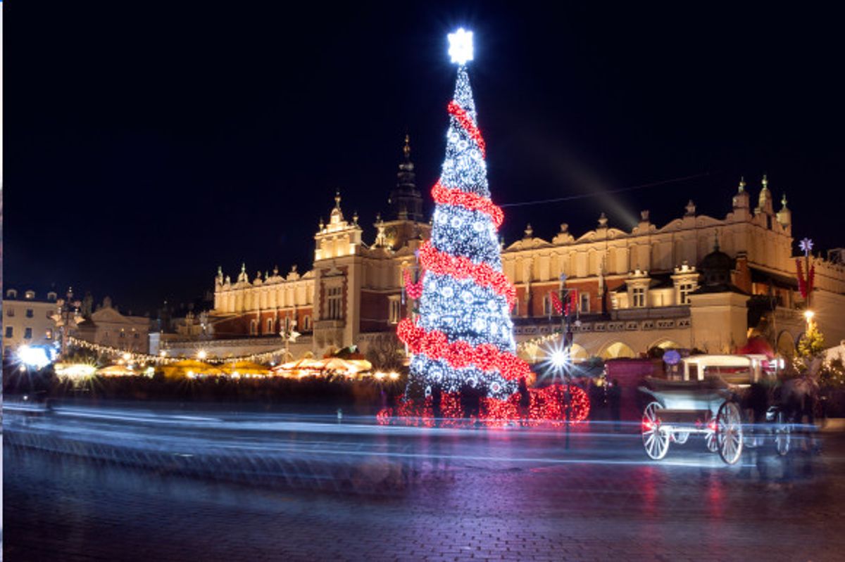 Main market square in Krakow with Christmas tree and market stalls