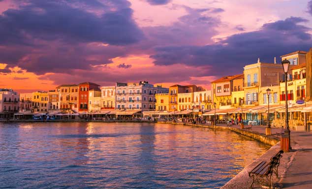 Sunset over the port in Chania, Crete