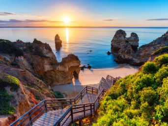 Steps down to a sandy beach in Portugal