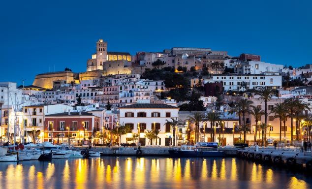 Traditional houses lining the harbour in Ibiza Old Town
