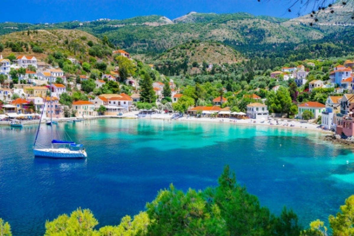 The shimmering waters of Assos Bay in Kefalonia Greece