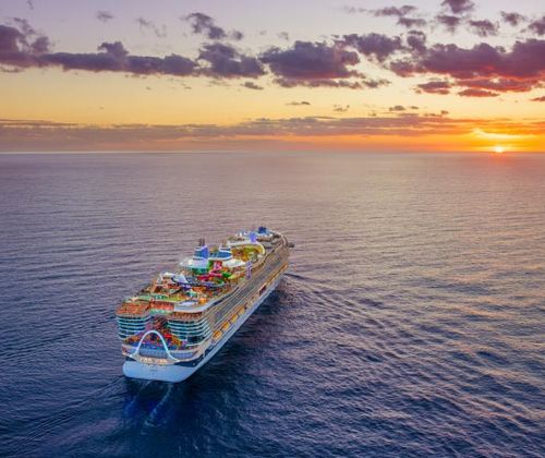 Icons of the Seas sailing into the sunset
