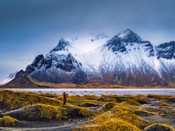 Snow covered mountains & lake in Iceland