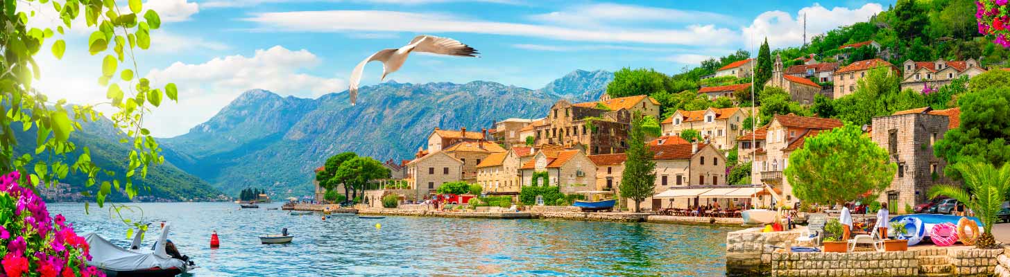 Stone houses around the shoreline of the Bay of Kotor