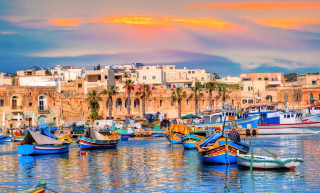 Colourful boats in the sea in Malta