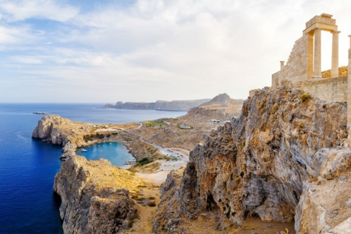 Rhodes Acropolis of Lindos. Doric columns the ancient Temple Athena Lindia the IV century BC and the bay St. Paul