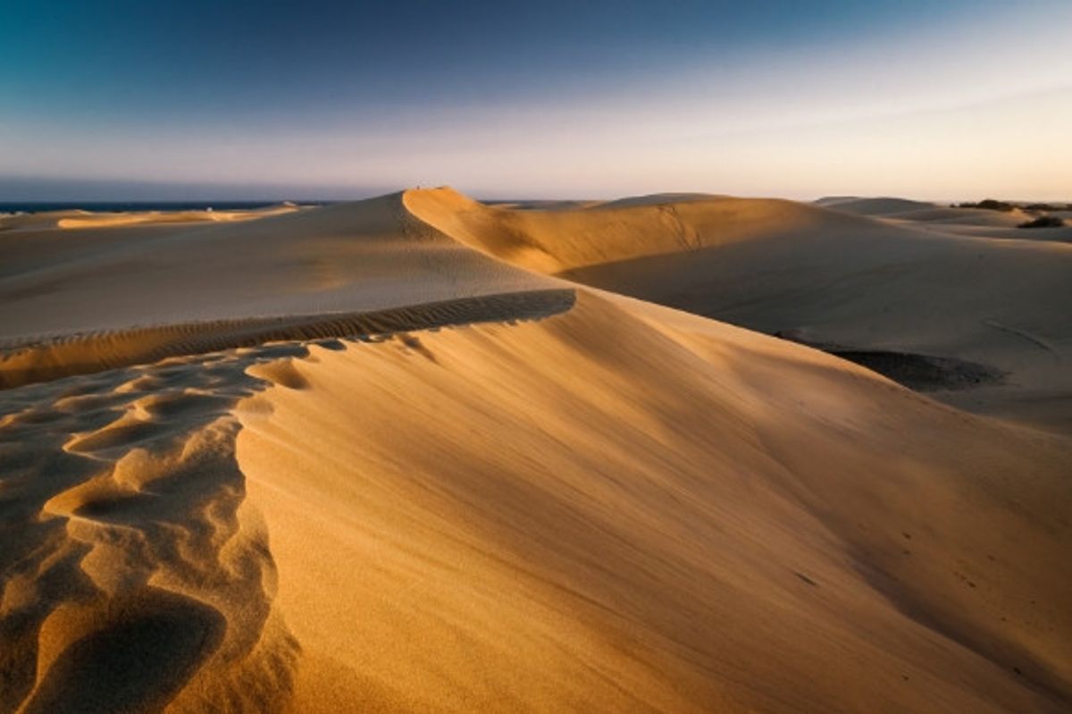 The famous Maspalomas sand dunes at sunset on the island of Gran Canaria in Spain