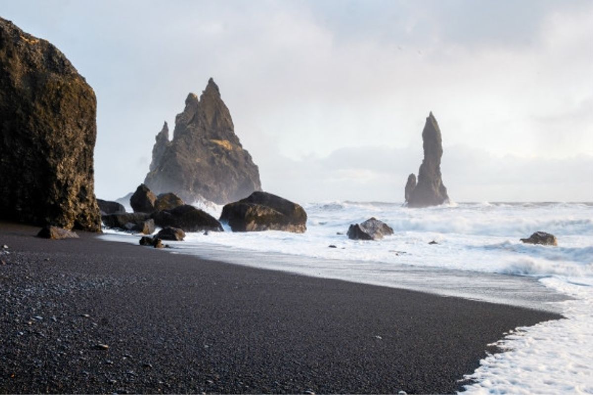 A frosty day on Iceland's volcanic black sand beach Reynisfjara