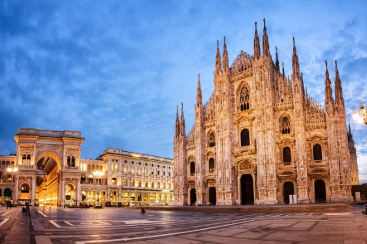 The stunning Milan Cathedral in Italy lit up at dusk 