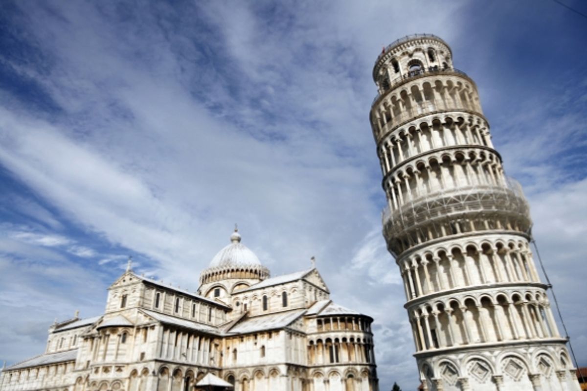A view of Pisa's iconic landmark Piazza del Duomo in Italy surrounded by blue skies