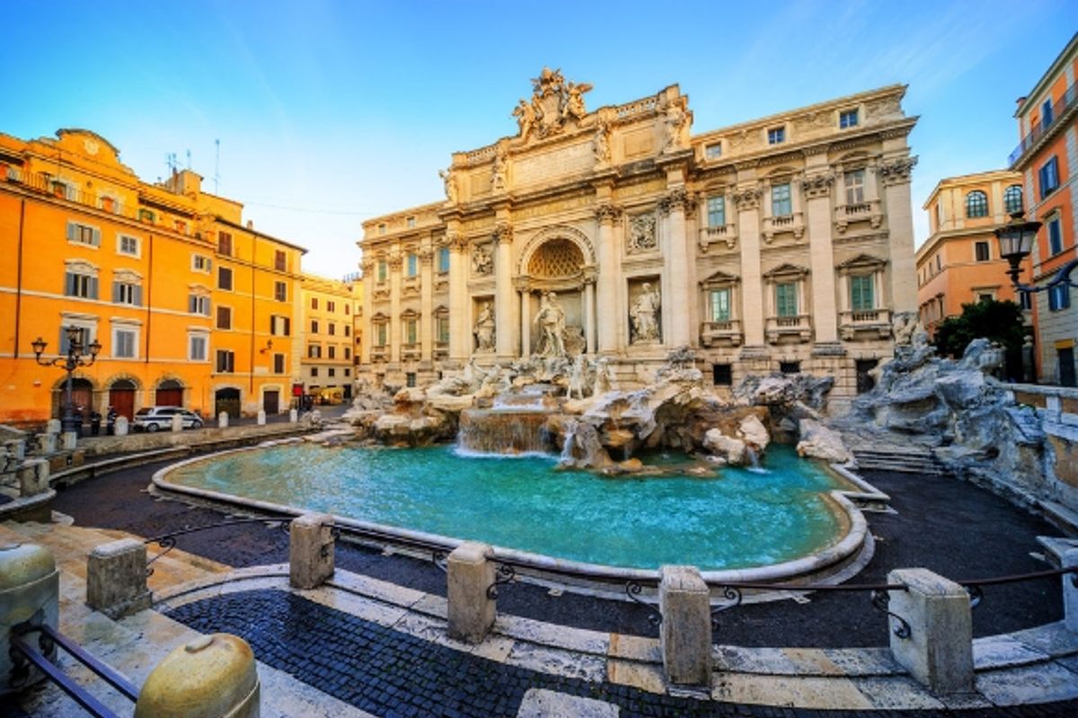 A beautiful sun-lit view of the famous Trevi Fountain in Rome