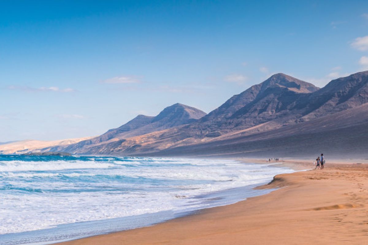 Cofete Beach surrounded by the Jandia Mountains with golden quiet sands