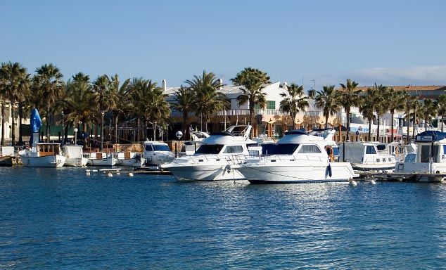 Boats in the harbour in Cala n'Bosch