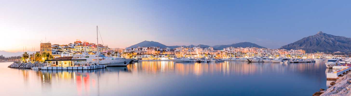 Marbella harbour at sunset