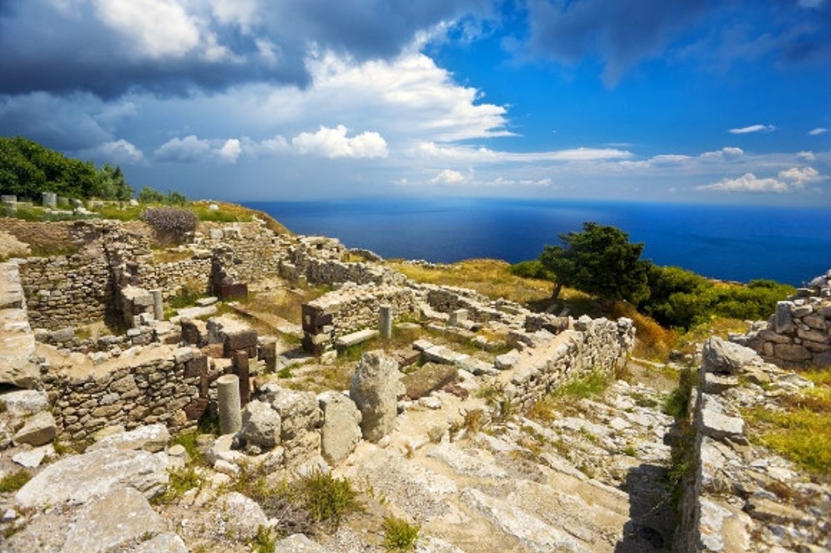 The crumbling ancient ruins of Thera (Thira) based on the hill of Mesa Vouno in Santorini, Greece.