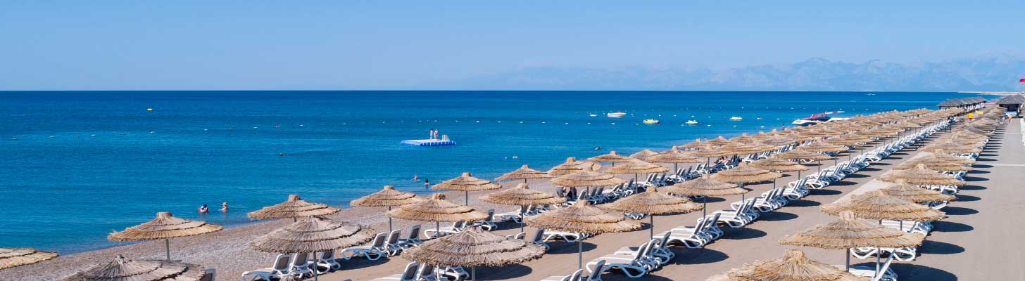 Sun loungers & umbrellas on the beach at Belek, Antalya