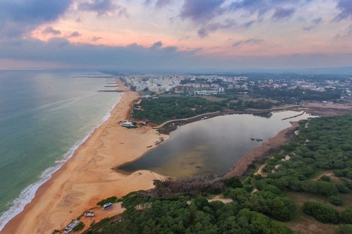Elevated view of the arresting beach in the town of Quarteira, which is found in Portugal's Algarve