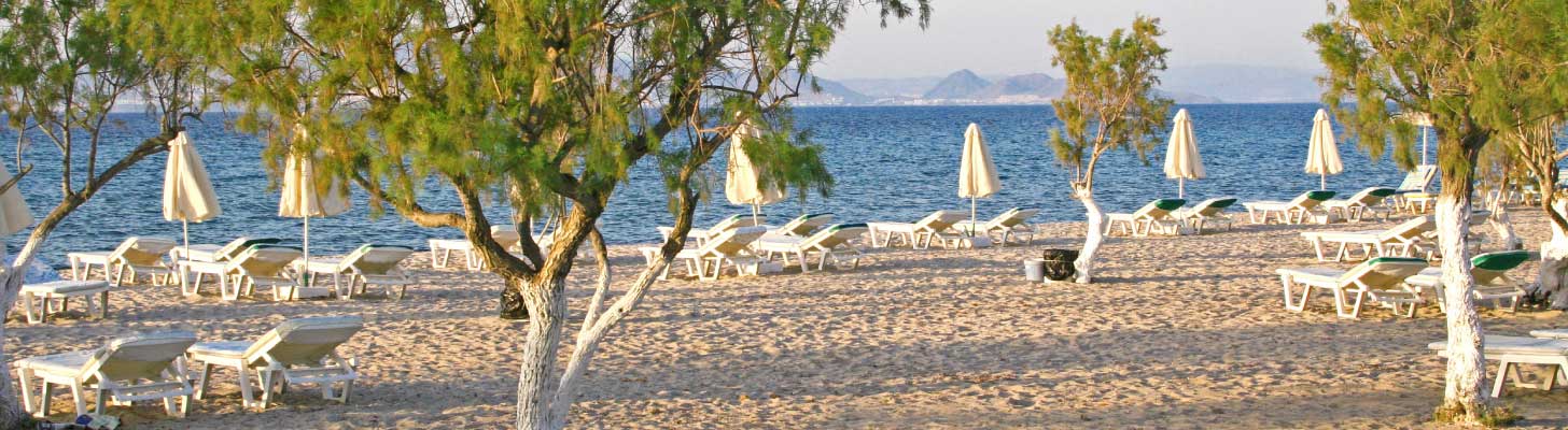 Gold sands & blue waters of Tigaki beach in Kos