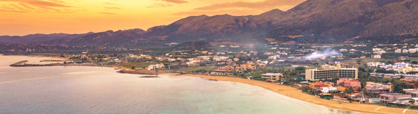 Panoramic view of the resort of Malia at sunset