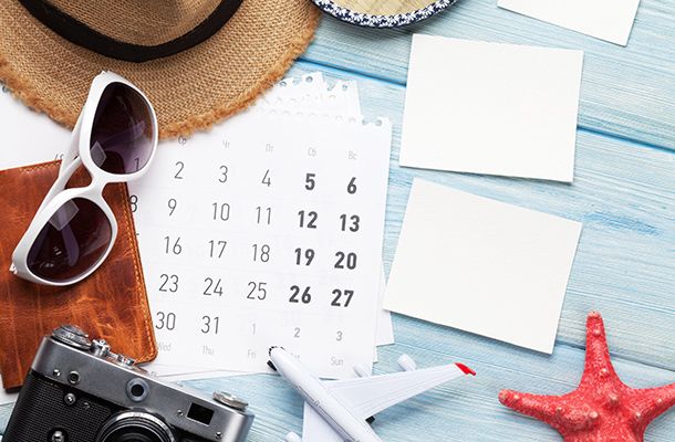 Calendar, sun glasses, sun hat & camera