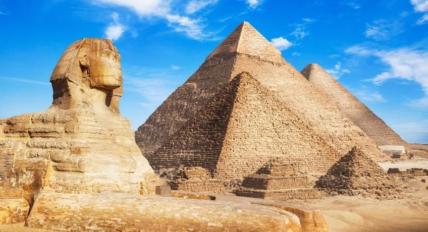 The Giza pyramids and sphinx with blue skies