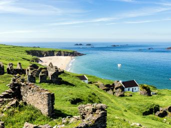 Traditional house overlooking the sea in Ireland