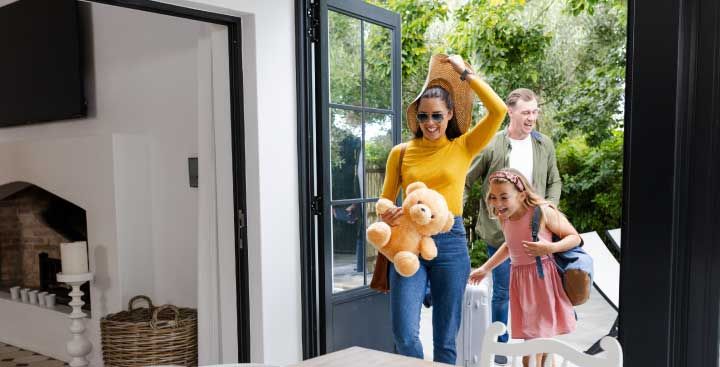 Family returning home from their holiday