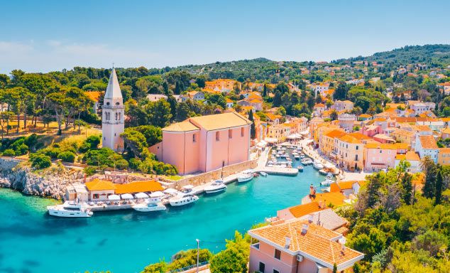 Traditional houses line the shore in Croatia