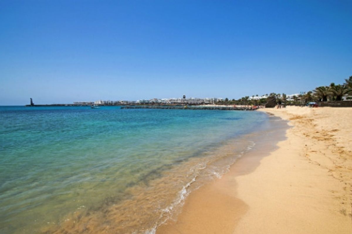 Secluded coast of Playa Cucharas lanzarote on a sunny day.