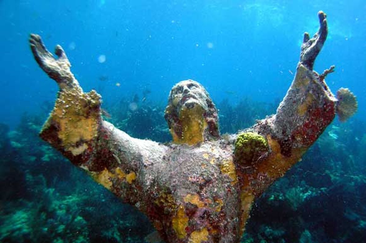 An underwater statue of Christ sat on Qawra bay's ocean floor