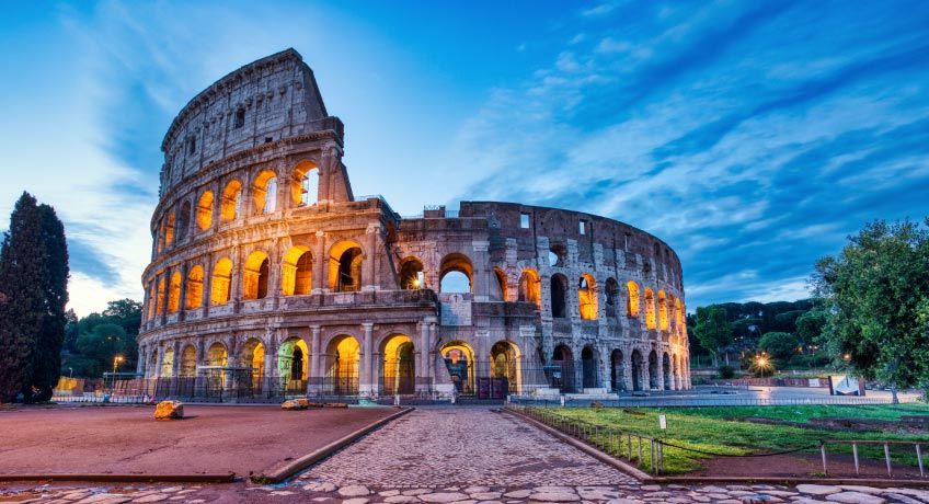 Colleseum in Rome lit up at dusk