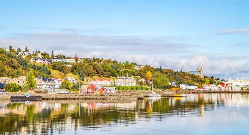 Traditional houses on the waters edge in Akureyri, Iceland
