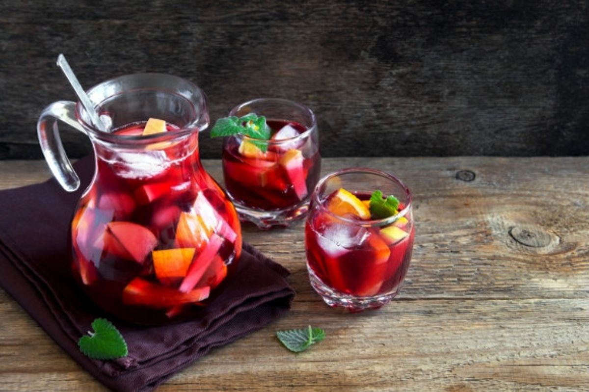 Fruit filled Sangria served in jugs and glasses in Spain, a colourful cocktail.