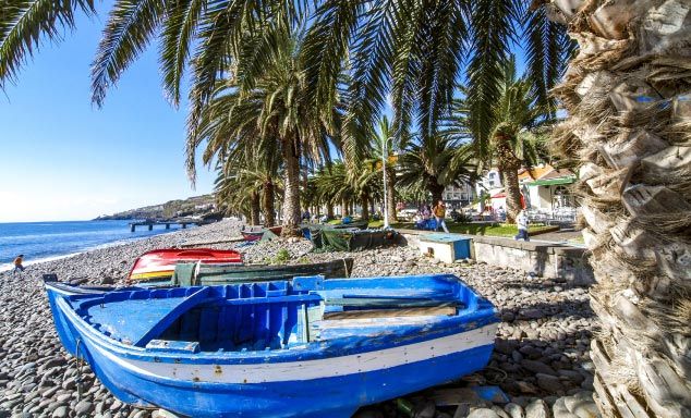 Colourful boats on the beach in Santa Cruz, Madeira