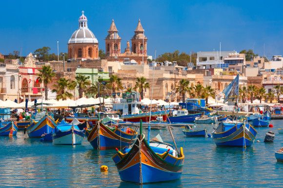 Colourful boats in the harbour in Malta